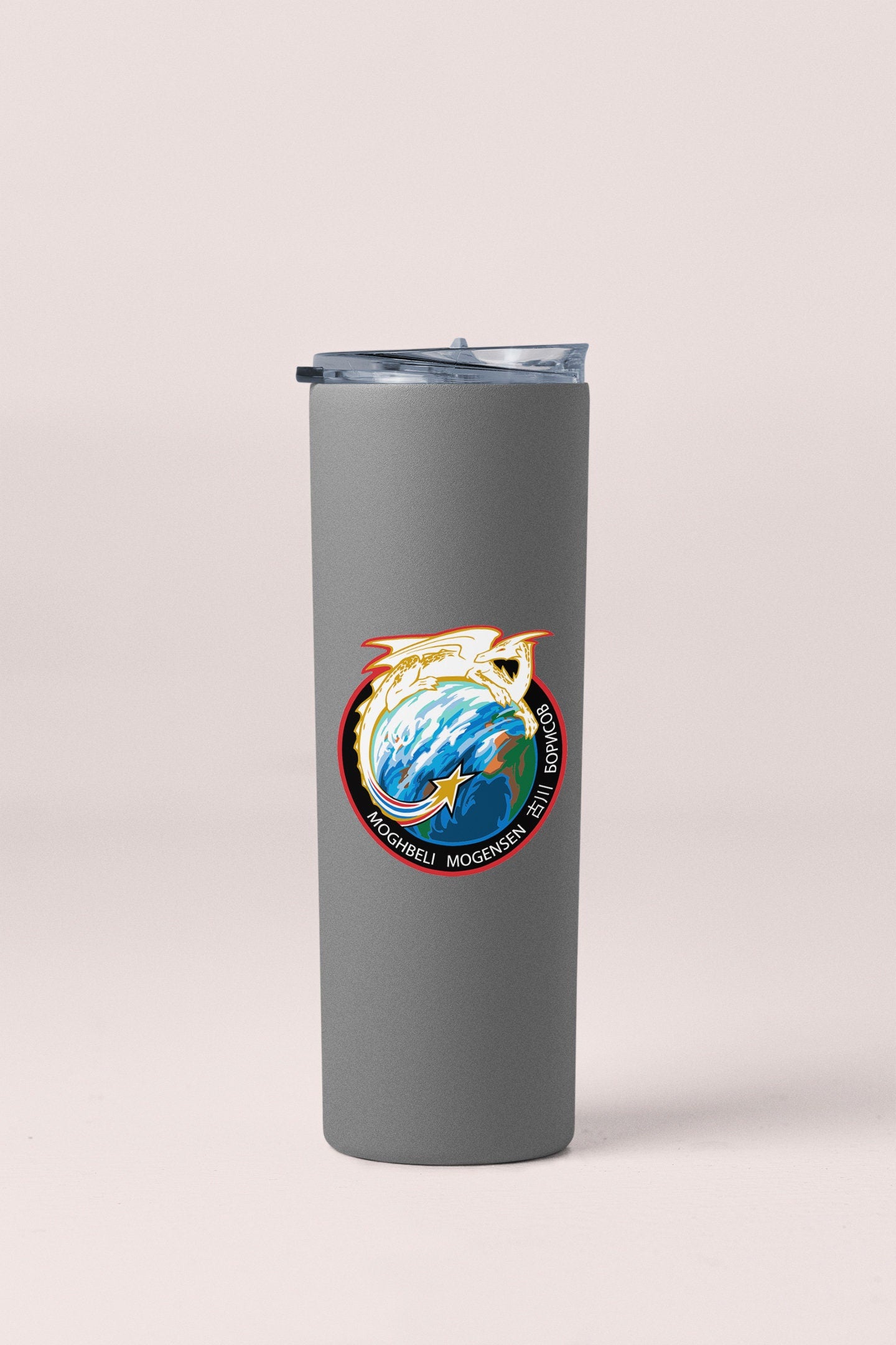a stainless steel tumbler with a picture of a dolphin on it