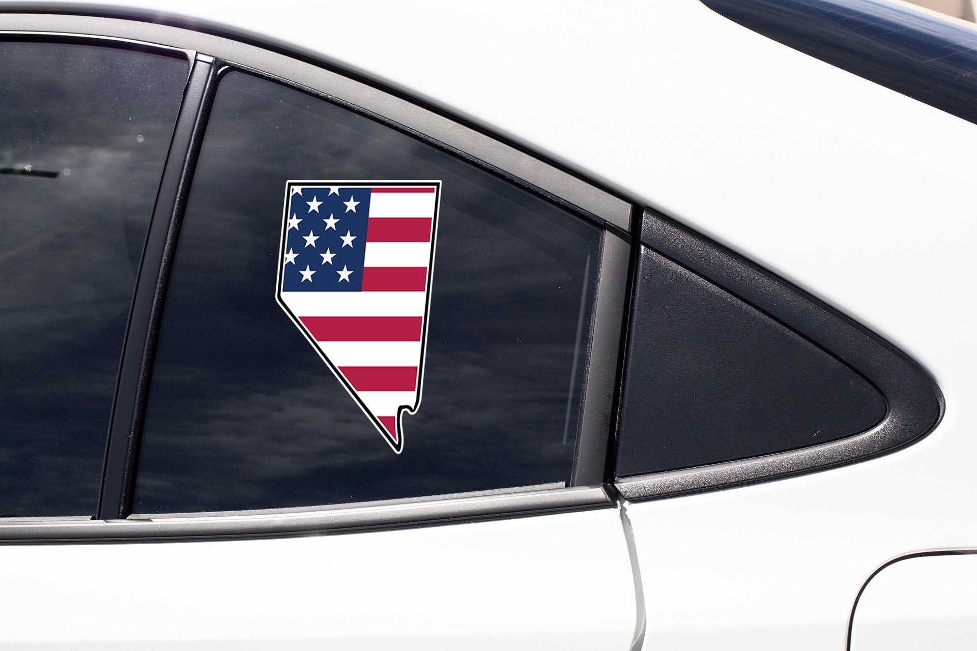 an american flag sticker on the side of a car